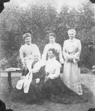 Two family portraits from the Madge Family album