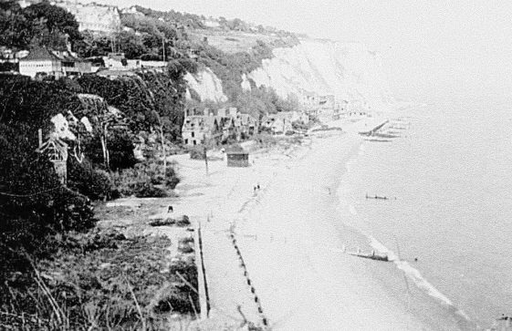 War damaged village on the beach. c1945