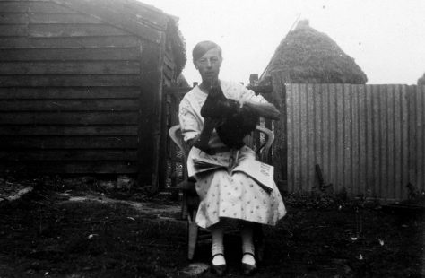 Annie Sharpe and a hen at Bockhill Farm
