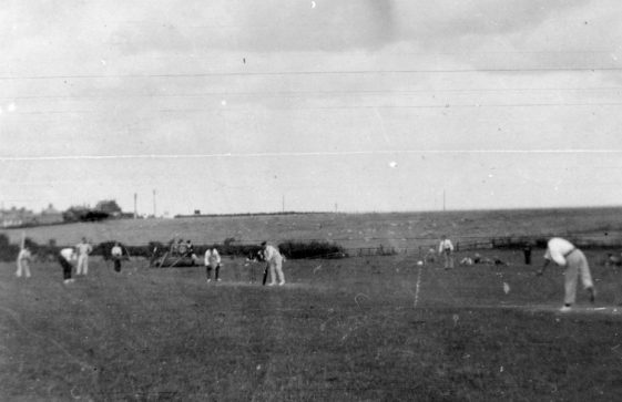 Captain Codd's XI playing cricket on Reach Meadow. 1906