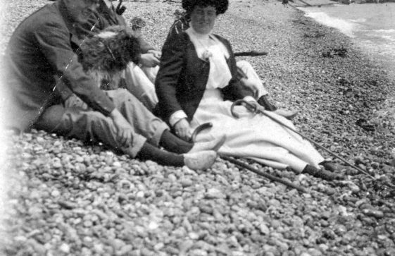 Sitting on the beach in St Margaret's Bay. c1900